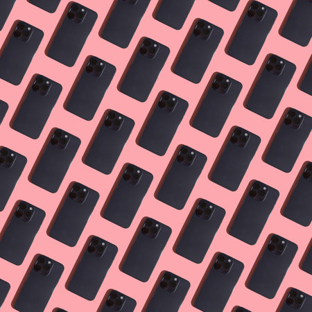 Seamless pattern of a modern smartphone on a pink backgroundの写真素材