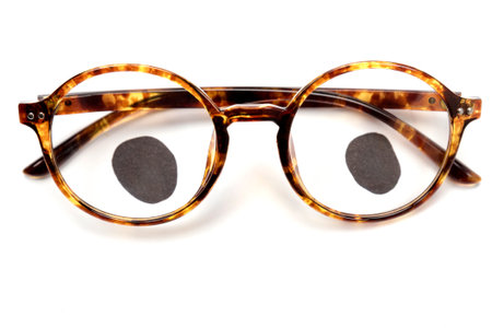 Leopard-colored frame of the glasses in which the eyes are drawn. isolatedの写真素材