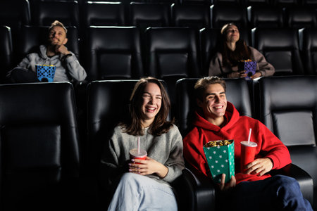 People came to see the comedy at the cinema. People's emotions when watching moviesの写真素材