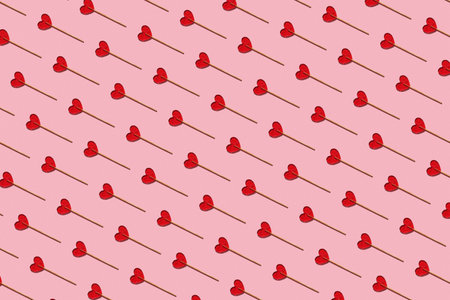 Seamless pattern of heart-shaped lollipops.の写真素材