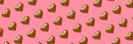 Seamless pattern of shiny heart-shaped stickers.