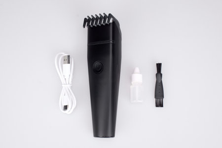Hair trimmer with ergonomic handle for barber work.