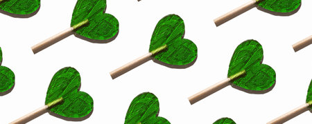 Seamless pattern of green candy hearts.の写真素材