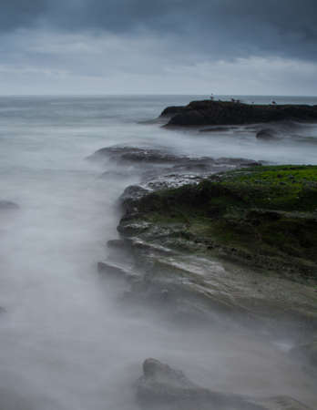 rocks leading out into the ocean 