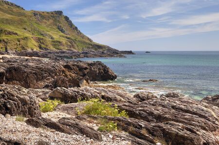 The rugged coastline at Great Mattiscombe Sand, Devon, England.
