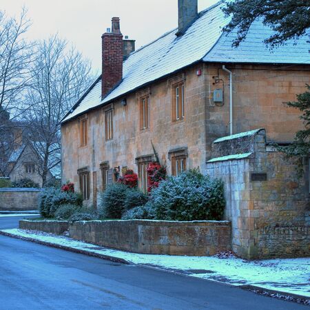 Terraced Cotswold stone cottages at Mickleton near Chipping Campden in winter, Gloucestershire, England.の写真素材