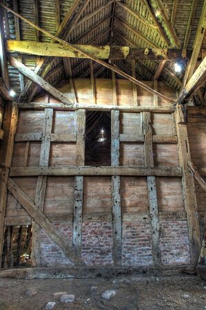 Large timber-framed and brick hay barn, Worcestershire, England.の写真素材