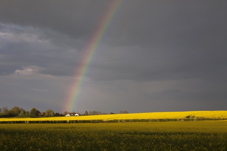 Rainbow onto house, Worcestershire, England.の写真素材