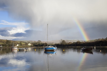 Rainbow over the Avon Estuary at Averton Gifford, Devon, England