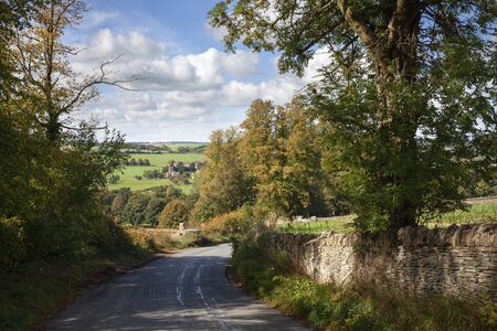 Lane towards Guiting Power, Cotswolds, Gloucestershire, Englandの写真素材