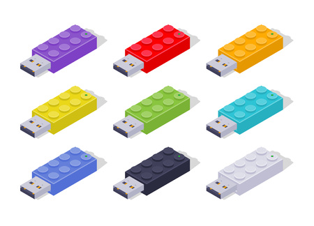 Set of the isometric colored USB flash-drives in a shape of the constructor bricks. The objects are isolated against the white background and shown from one sideのイラスト素材
