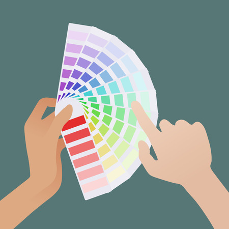 Female hand holding the color guide and pale male hand picks the shadeのイラスト素材