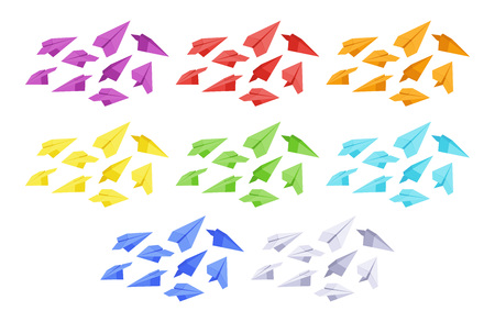 Set of the colored paper planes. The objects are isolated against the white background and shown from different sidesのイラスト素材