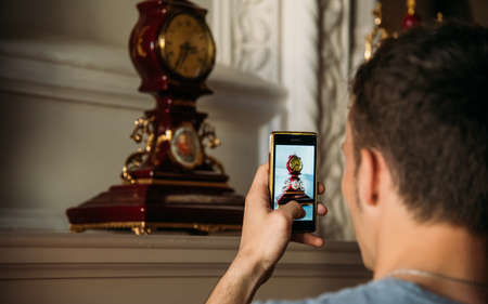 Shooting clock on the phoneの写真素材