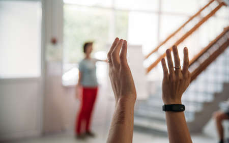 raising handsの写真素材