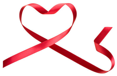 Red ribbon in heart shape isolated on white