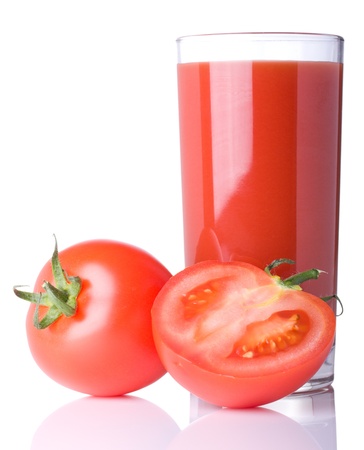 tomato juice in glass isolated on whiteの写真素材