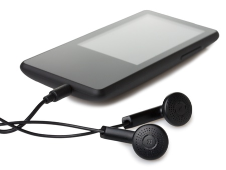 audio player with headphones isolated on white backgroundの写真素材
