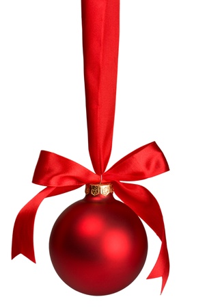 red christmas  ball hanging on ribbon isolated on whiteの写真素材