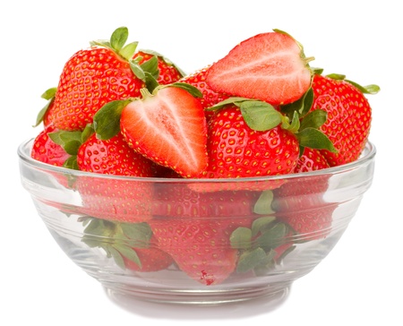 glass bowl with fresh strawberries isolated on white backgroundの写真素材