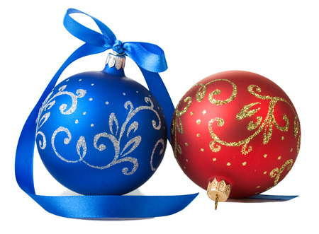 blue and red christmas balls with ribbon bow isolated on white backgroundの写真素材
