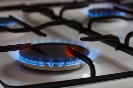 gas burner with blue flameの写真素材