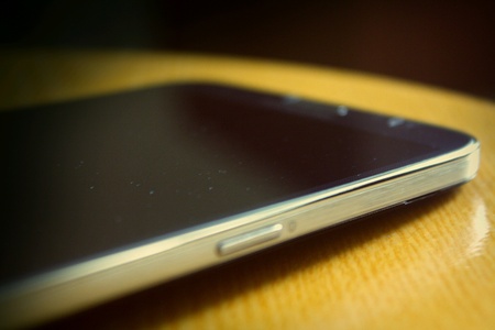 A side angle shot of a smartphone