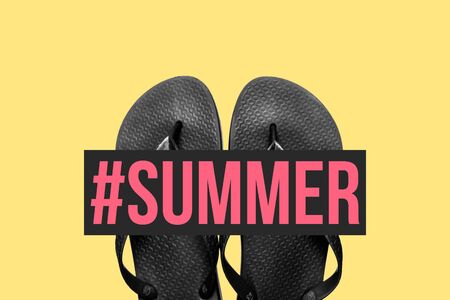 Concept of start or end of summer, having fun on a beach, having a beach-party. Black and white flip-flops with a red text in foreground saying SUMMER. Yellow background. Contemporary art collageの写真素材