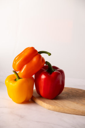 Bulgarian pepper of different colors on a white background. High quality photo