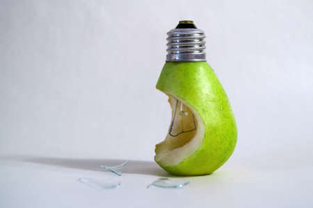 green pear on white background pear lamp glass fragments, found or lostの写真素材