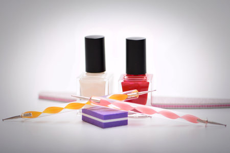 Nail polish and manicure tools on a white background. selective focus.の写真素材