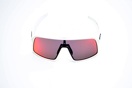 Sunglasses with red glass isolated on white background. selective focus.の写真素材