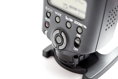 Professional flash isolated on a white backgroundの写真素材