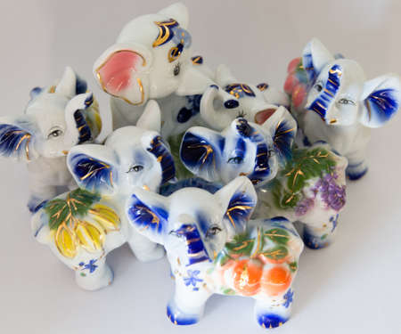 Symbol of seven elephants figurines on a white background, Feng Shuiの写真素材