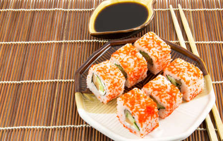 Japanese seafood sushi rolls with  soy sauce backgroundの写真素材