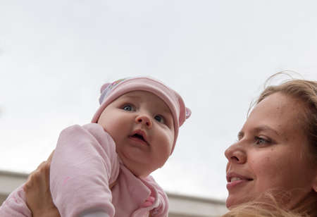 Portrait of mother and cute baby