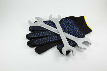 Wrenches work gloves on a white background