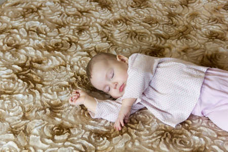 Portrait of a sleeping cute newborn babyの写真素材
