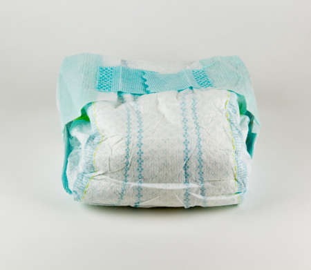 Full baby diaper on a white backgroundの写真素材