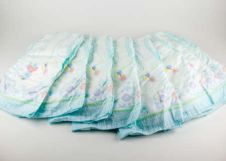 Baby diapers on a white backgroundの写真素材