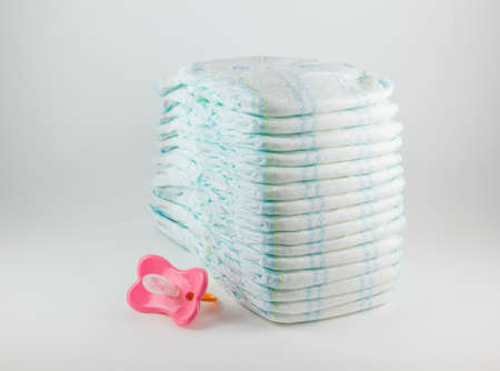 Baby diapers on a white backgroundの写真素材