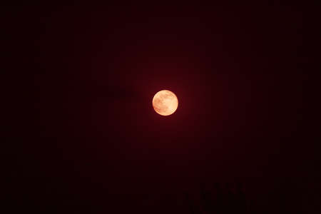 full moon on a dark background. cratersの写真素材