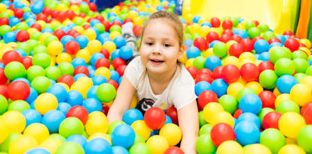 Child plays fun in the entertainment center. Game center