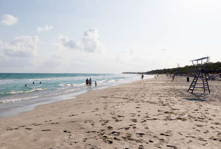 Varadero, Cuba - May 20, 2021: Varadero beach. Tourists swim and sunbathe. Clear turquoise waterのeditorial素材