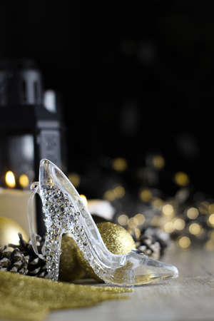 still life with glass slipper and christmas decorationの写真素材