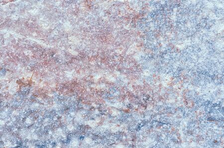 Granite natural surface. Stone texture. Stone old wall. Texture pattern. Natural stone close-up. Structural surface close-up.の写真素材