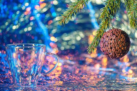 Christmas tree branch with Christmas toy made of coffee and cup for coffee.の写真素材