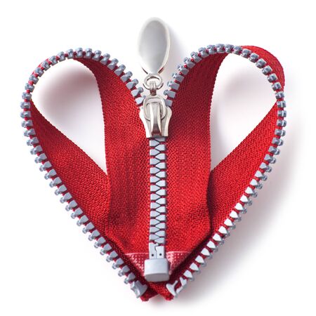 Red zipper in shape of a heart on white background.の写真素材