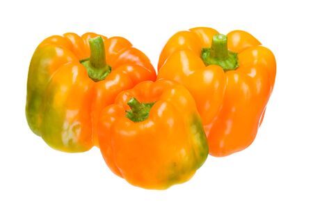 Bulgarian pepper. Orange sweet pepper on a white background. Fresh vegetables. Healthy food. Orange sweet peppers, great design for any purpose.の写真素材
