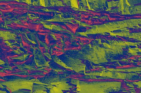 Colorful (red, pink, yellow and purple) stone mosaic tiles on the wall as a background or texture. An abstract composition.の写真素材